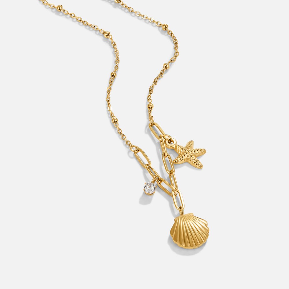 Greta – Collana con pendente a forma di stella color oro.